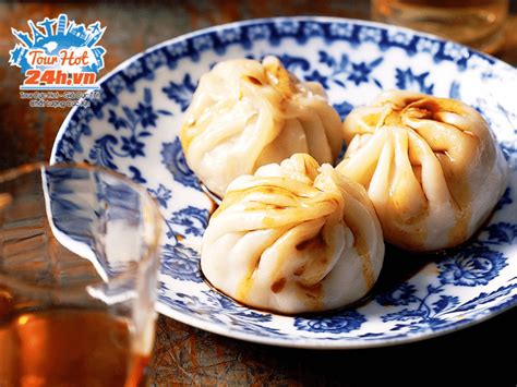  Bánh Bao Rượu Xinyang: Sự kết hợp hoàn hảo giữa hương vị ngọt ngào và vị cay nồng của rượu!