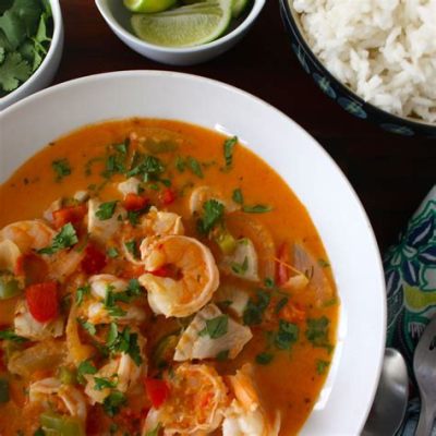  Moqueca -  Một bữa tiệc hải sản với hương vị chua ngọt của leche de tigre và sự béo ngậy của dừa!